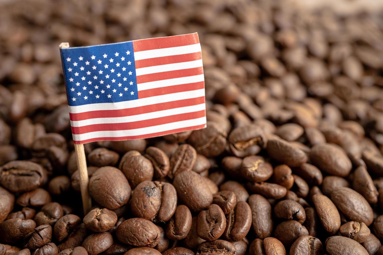 America USA flag on coffee bean, import export trade online commerce concept. photo