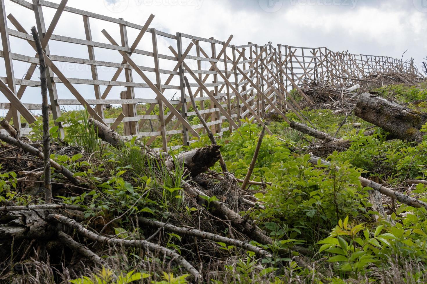 wooden fence in the mountains photo
