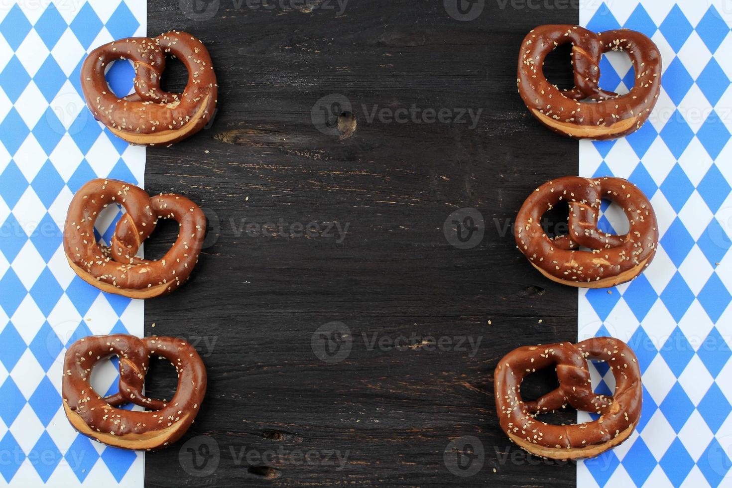 Original Bavarian Pretzels on Wooden Board. Oktoberfest Background photo