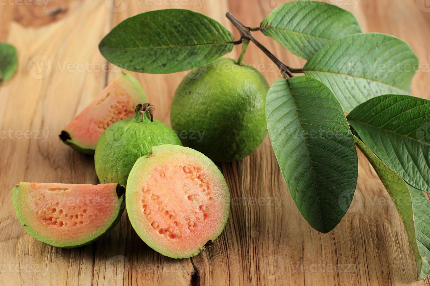 Closeup of a Pink Red Guava Cut in Half, Fresh Picked photo