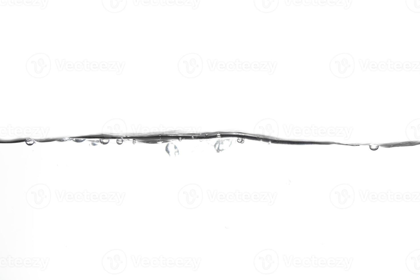 Splashing water surface with a white background photo