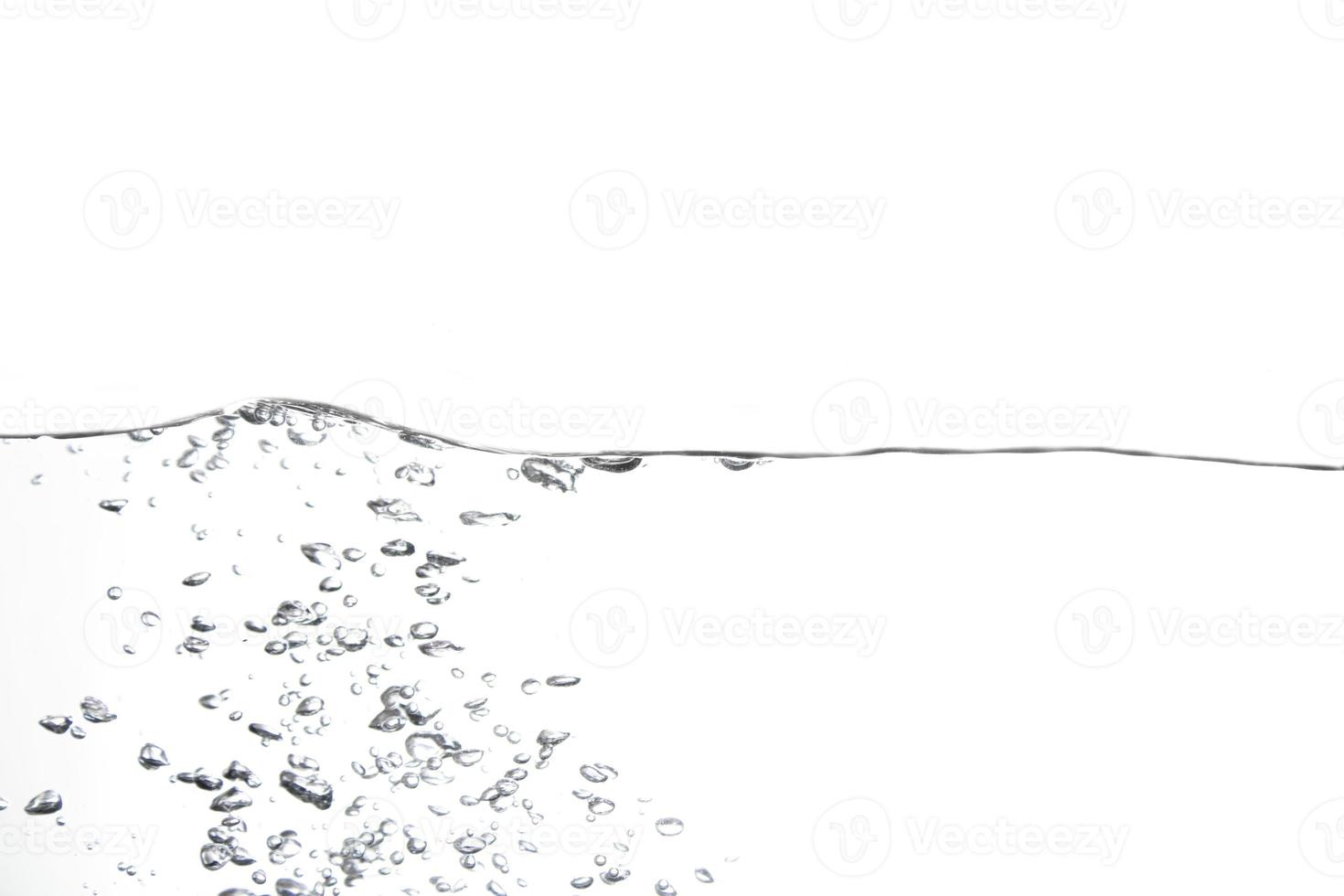 Splashing water surface with a white background photo