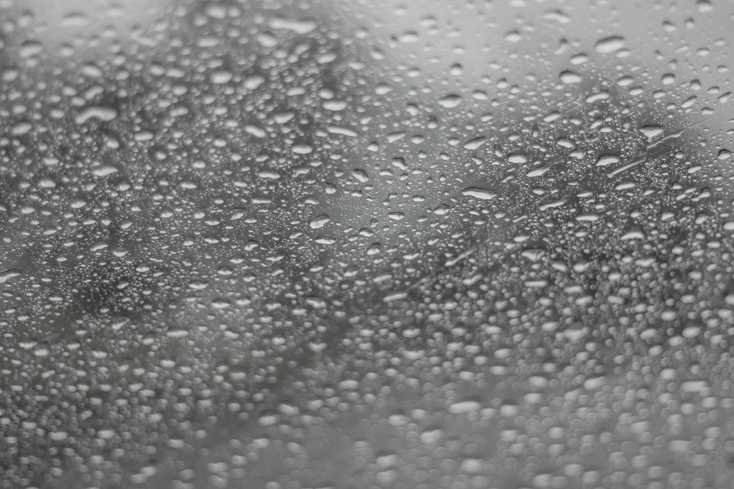Glass with each water out attached to the background photo