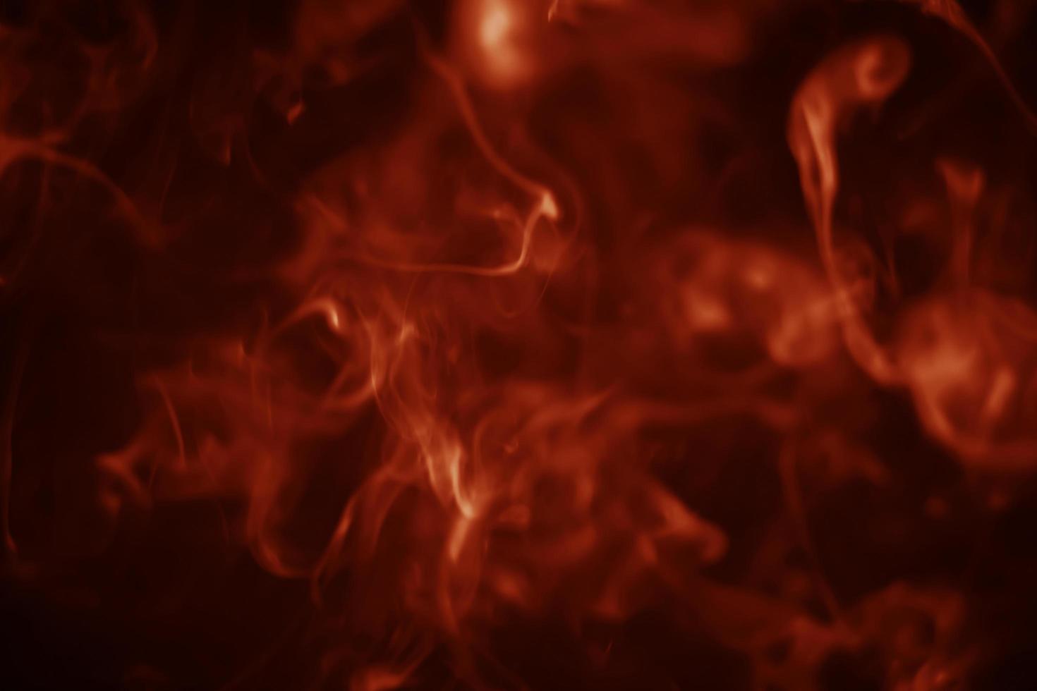 Abstract smoke, lush lava, a mixture of bright orange and dark red photo