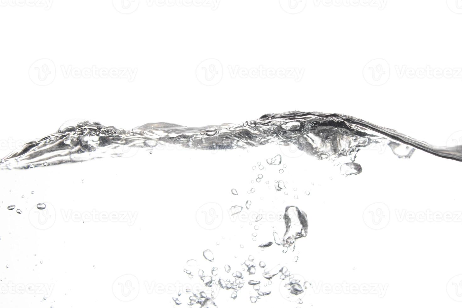 Splashing water surface with a white background photo