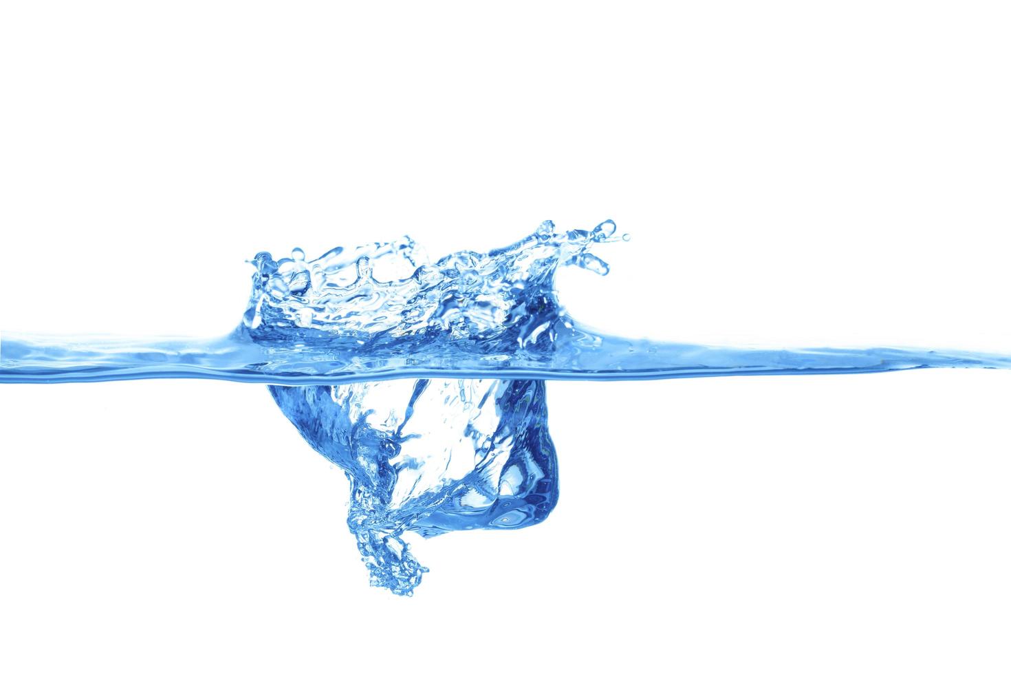 The surface of the water splashes blue, the side view is set on a white background photo