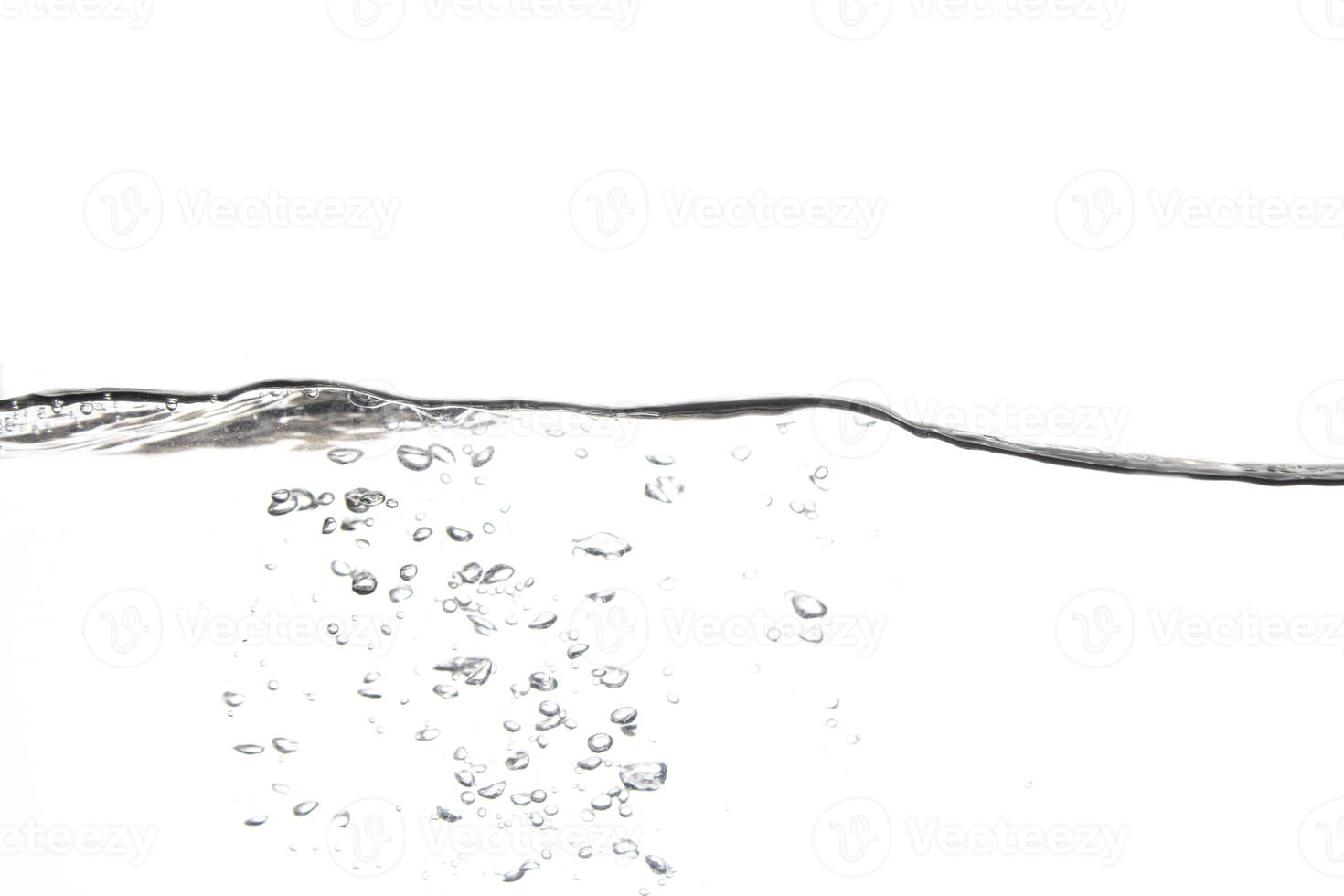 Splashing water surface with a white background photo