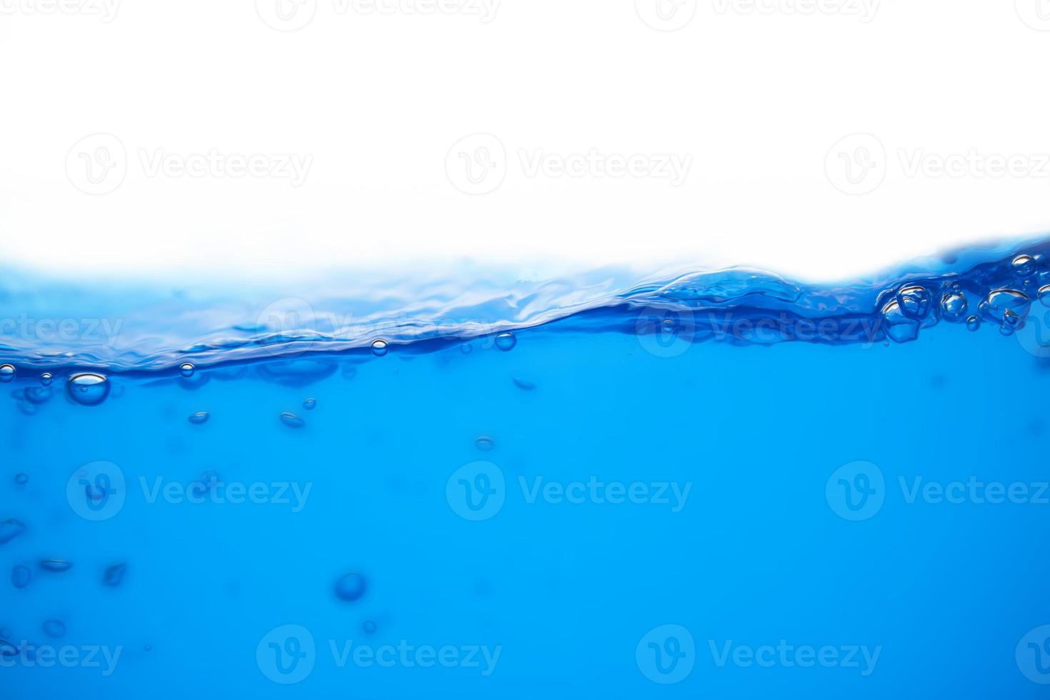 The surface of blue water that is splattered or moving photo