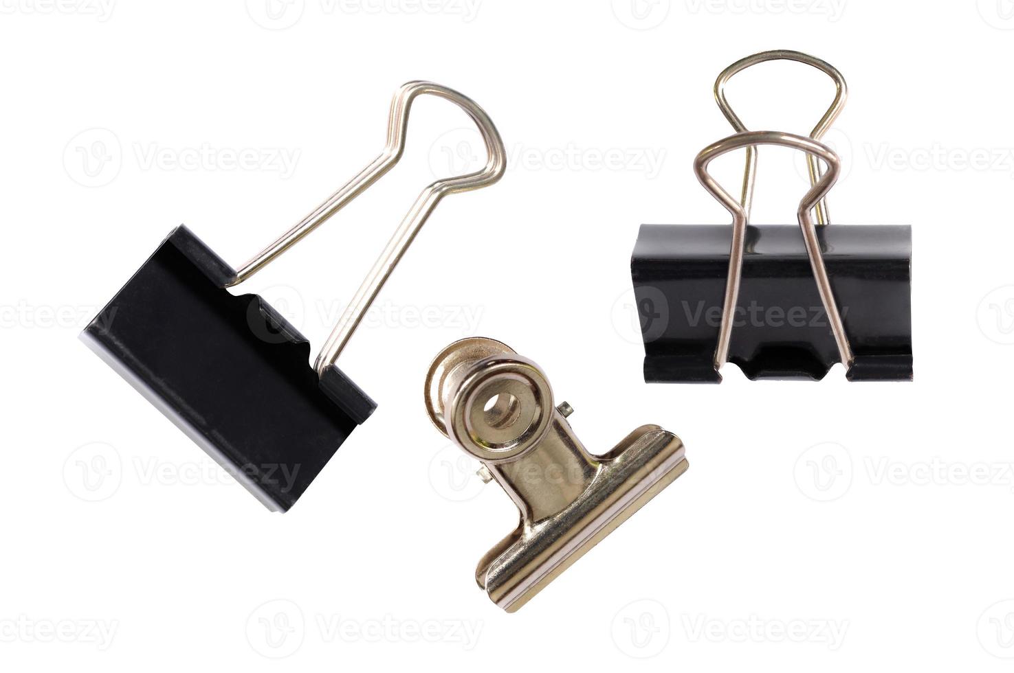 old black paper clip isolated on a white background. photo