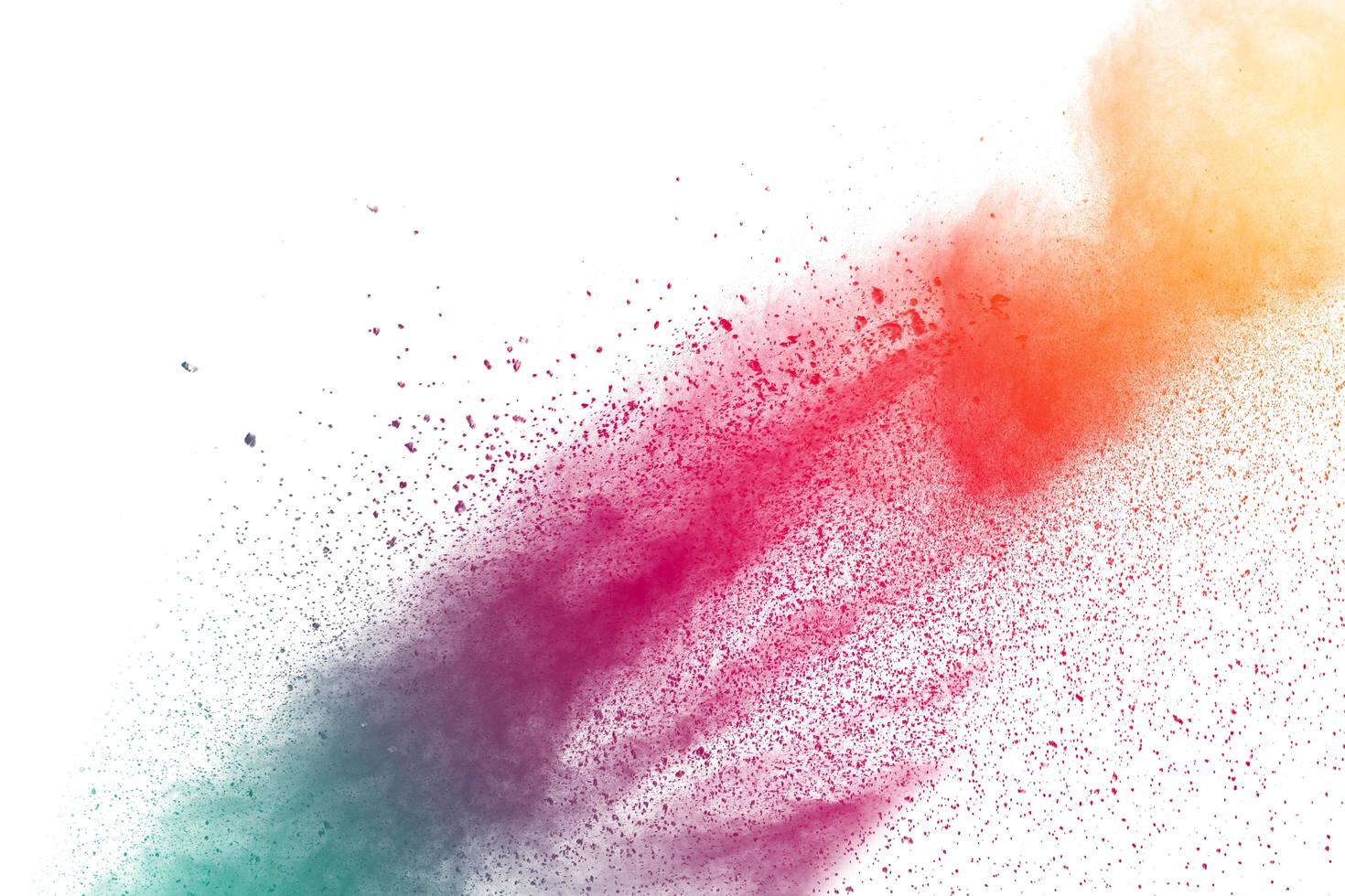 Multicolor powder explosion on white background. Colored cloud. Colorful dust explode. Paint Holi. photo