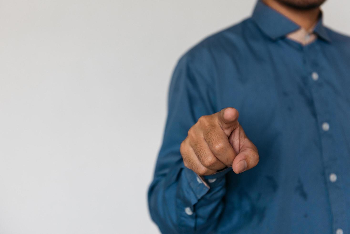 Young handsome man wearing light blue shirt with different behaviors at work photo
