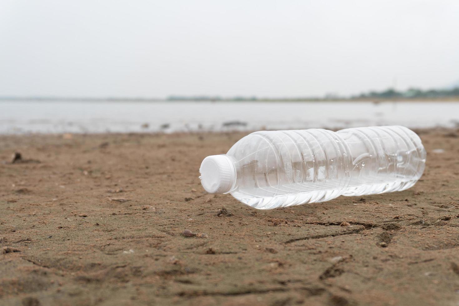 Plastic water bottles pollution in the ocean Environment concept photo