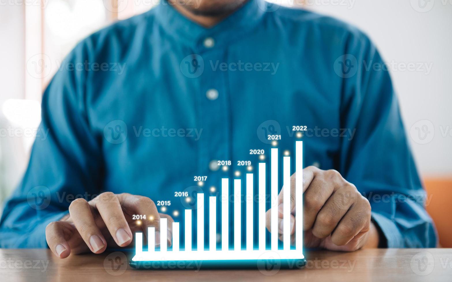 Businessmen of stock invesment using smartphone for checking worldwide stock exchanges interface on screen with graphic icons photo