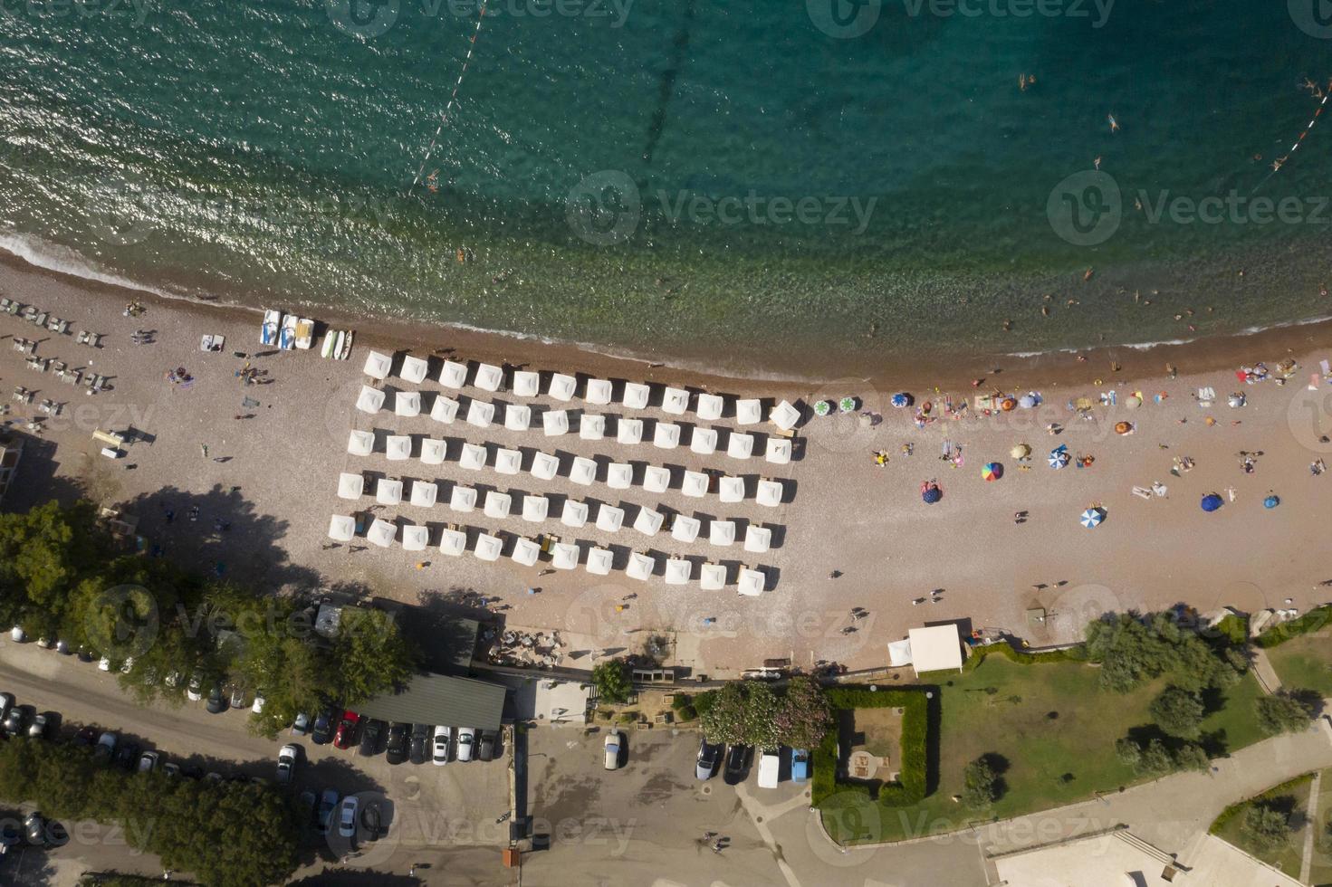 Aerial view on beach by Sveti Stefan inslet in Montenegro photo