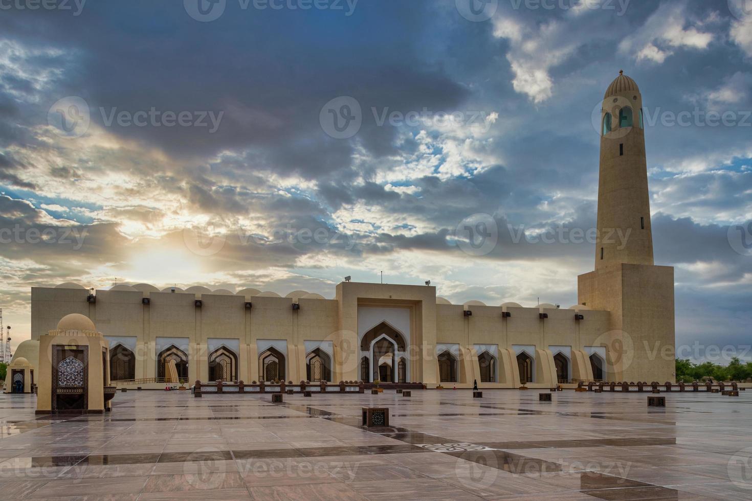 Qatar State Mosque ,Imam Muhammad ibn Abd al-Wahhab Mosque, exterior view at sunset with clouds in the sky photo