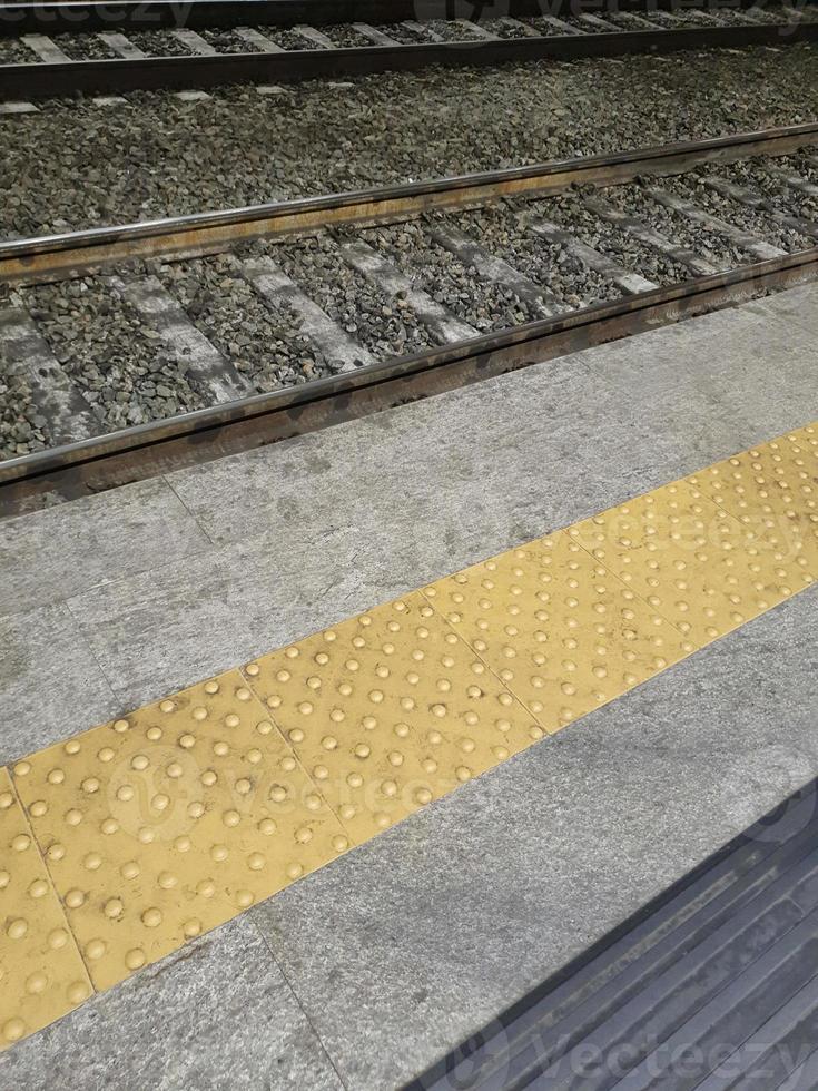 railway tracks and platform photo