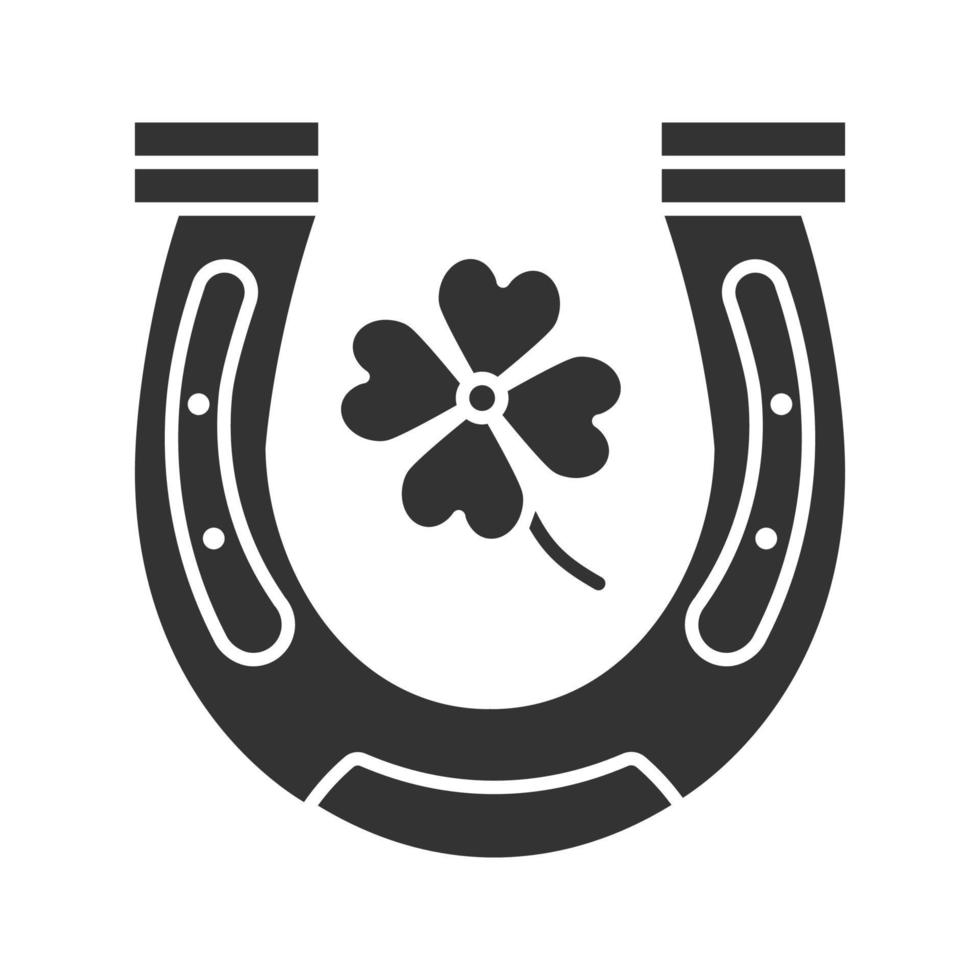 Horseshoe and four leaf clover glyph icon. Symbols of success and good luck. Silhouette symbol. Negative space. Vector isolated illustration
