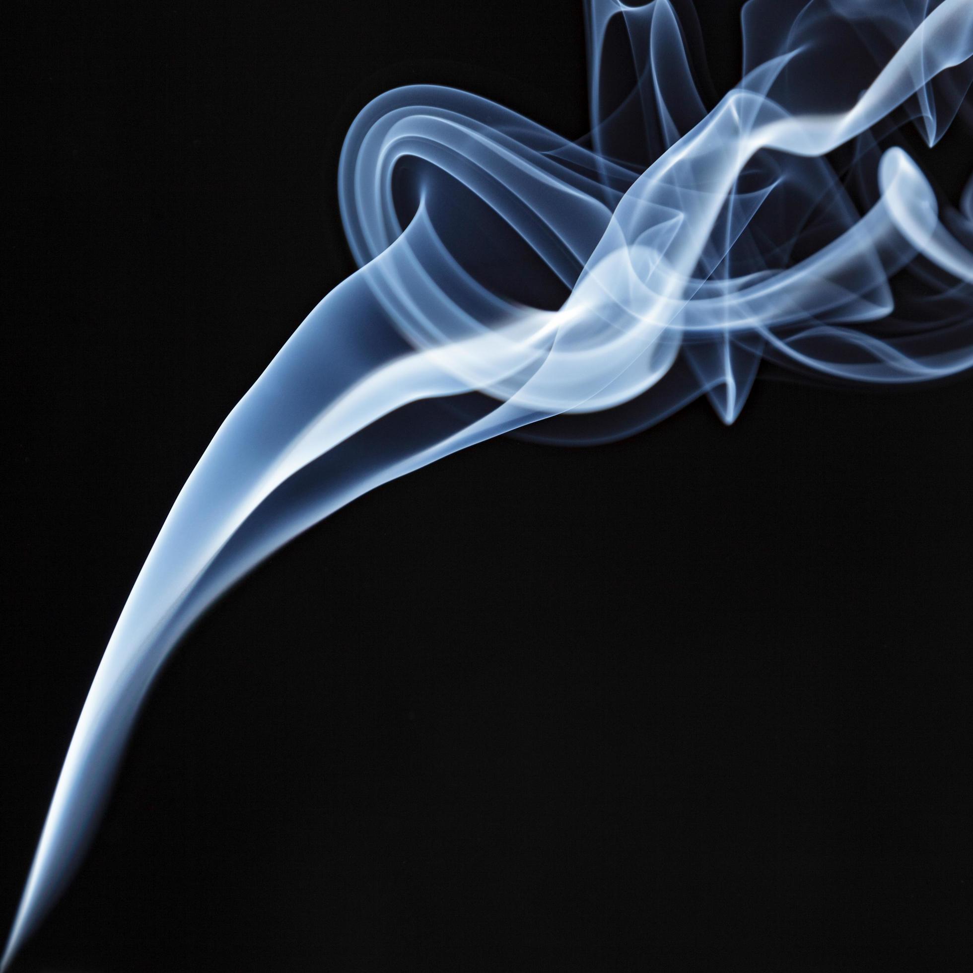 Incense Stick Smoke Trail against a Black Background 8104854 Stock