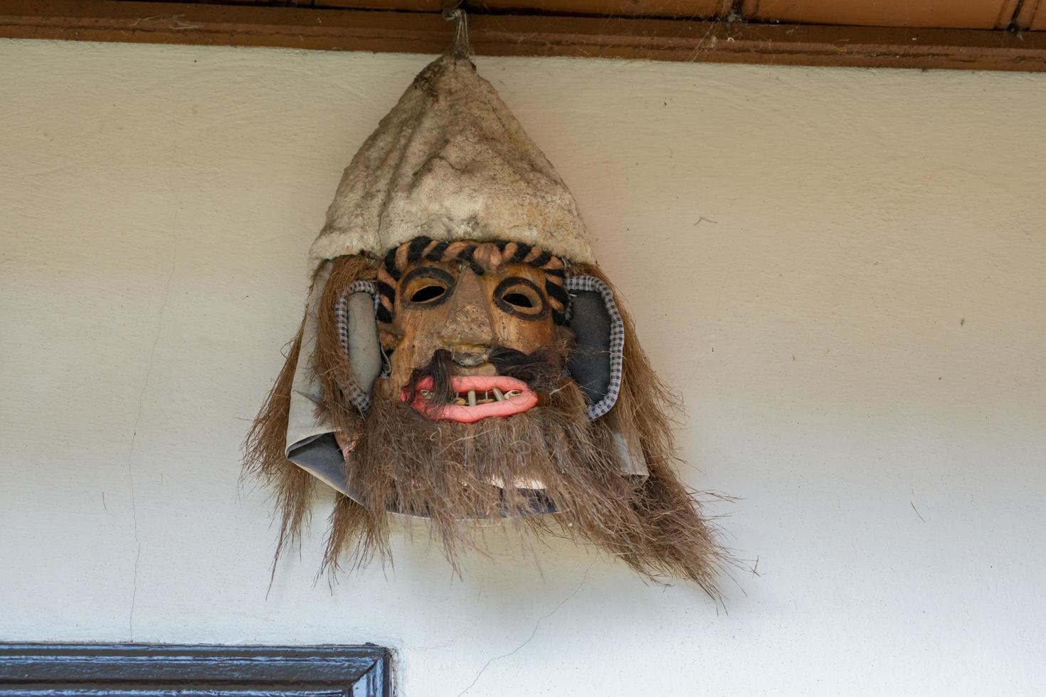 Face masks in the Neculai Popa Ethnographic Museum in Tarpesti in Moldovia Romania on September 19, 2018 photo