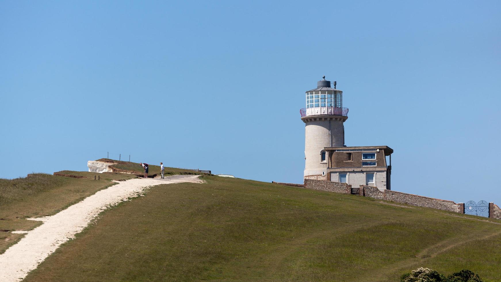 The Belle Toute Lighthouse at Beachy Head in Sussex on May 11, 2011. Unidentified people. photo