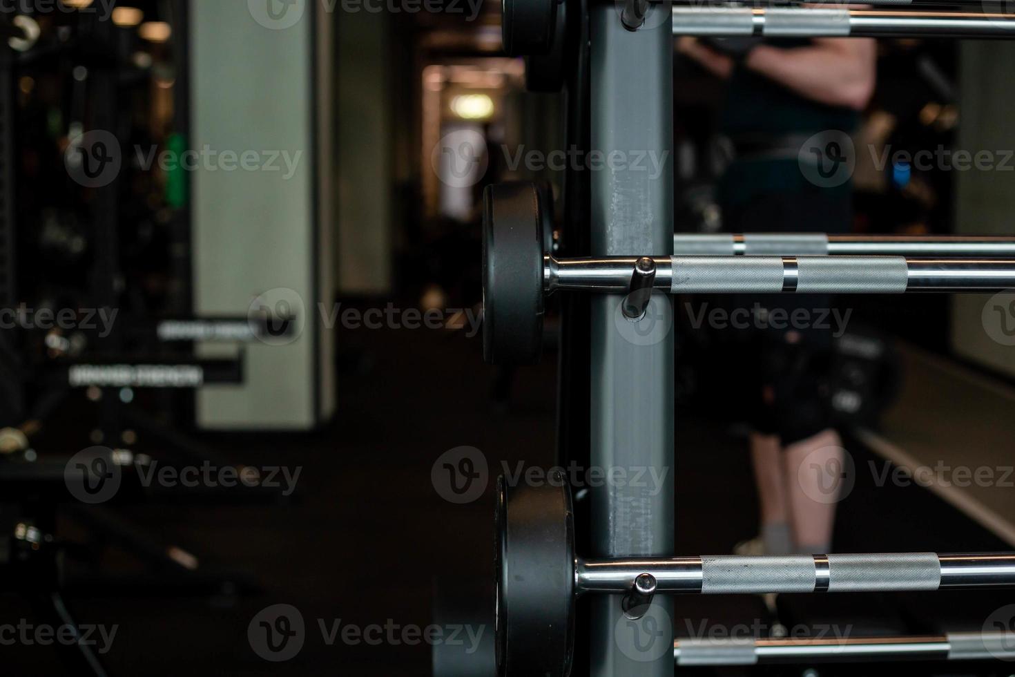 Dumbbells in the fitness club. Gym concept. photo