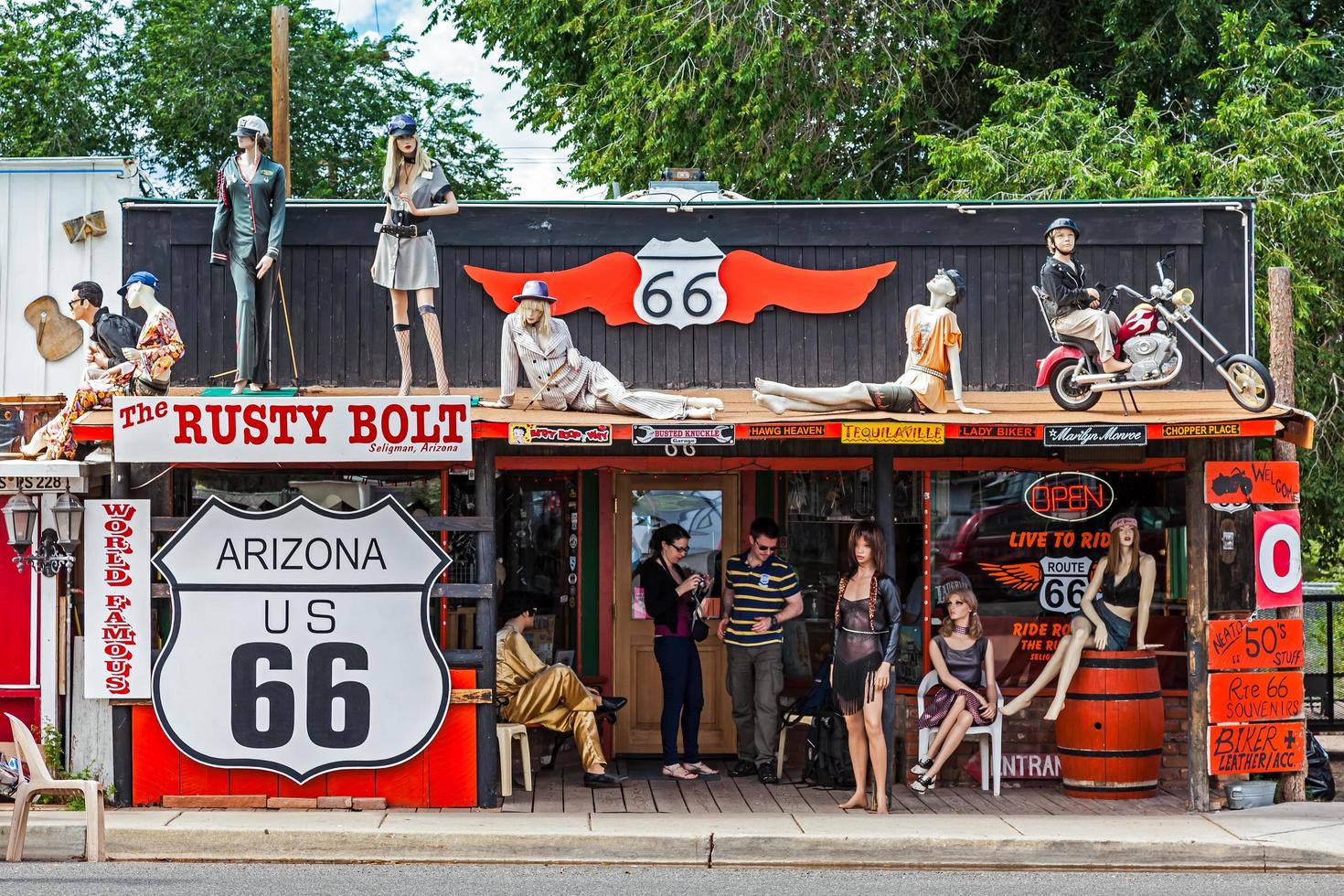 Old store in Seligman Arizona on July 31, 2011. Two unidentified people photo