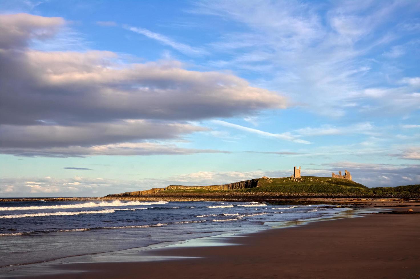 Sunset at Dunstanburgh Castle photo