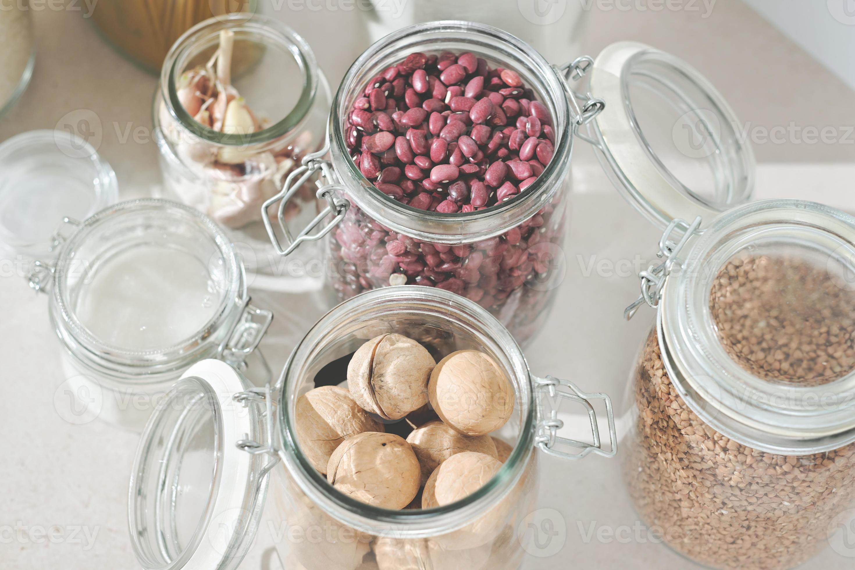 https://static.vecteezy.com/system/resources/previews/008/110/626/large_2x/glass-jars-grocery-stock-food-and-cereals-zero-waste-kitchen-plastic-free-pantry-no-plastic-eco-family-life-close-up-view-photo.jpg