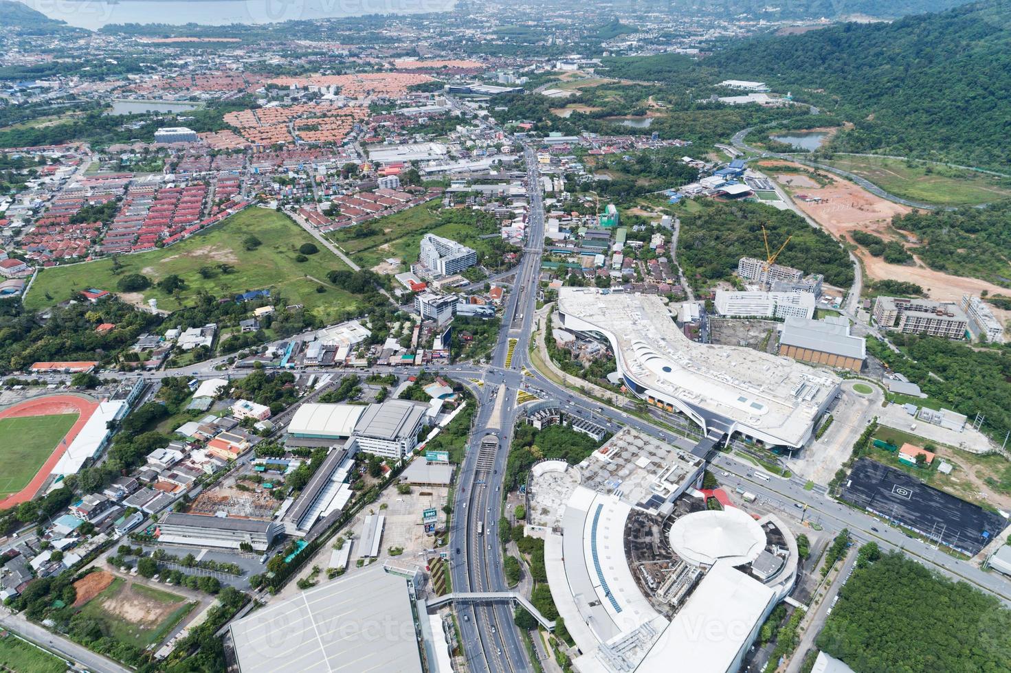 Drones Aerial View top down of road junction from above Image for transportation background,automobile traffic of many cars and sign,symbol on road. photo