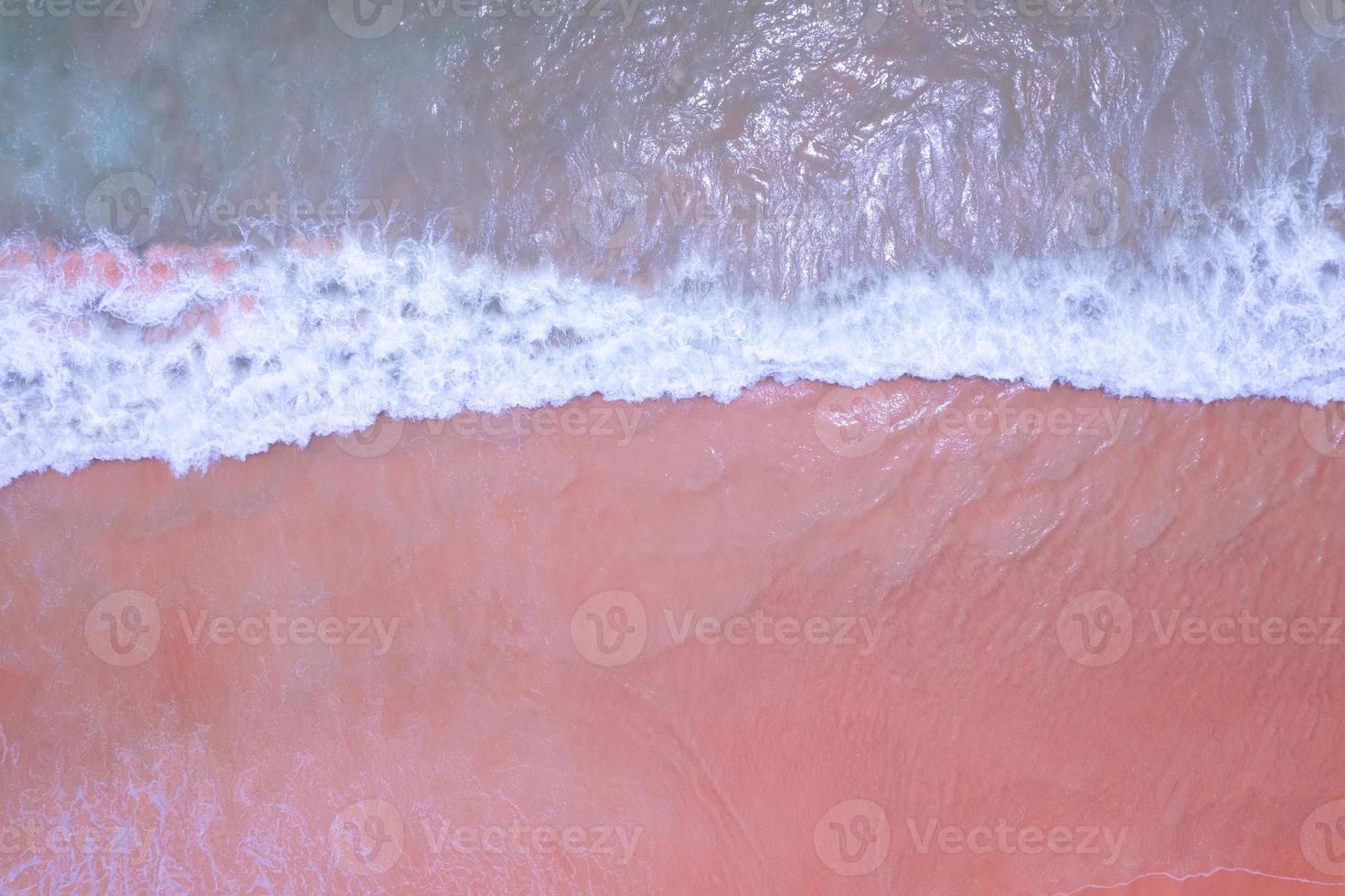 Top view of amazing pastel pink sand beach and turquoise sea copy space available nature background High angle view sea photo