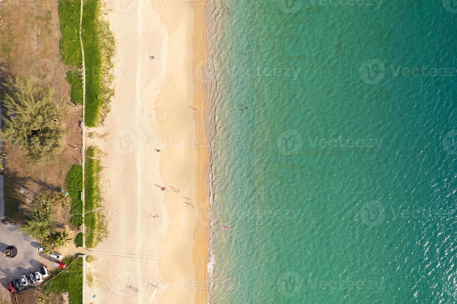 Phuket Thailand Aerial view sandy beach and waves Beautiful tropical sea in the morning summer season image by Aerial view drone shot, high angle view Top down beach photo
