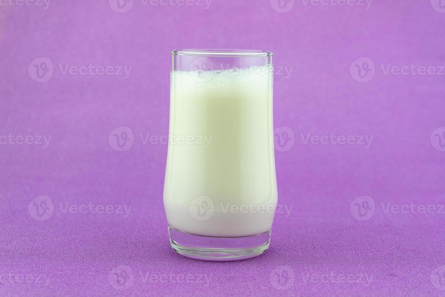 Banner of a glass of milk on colorful background Milk day Copy space photo