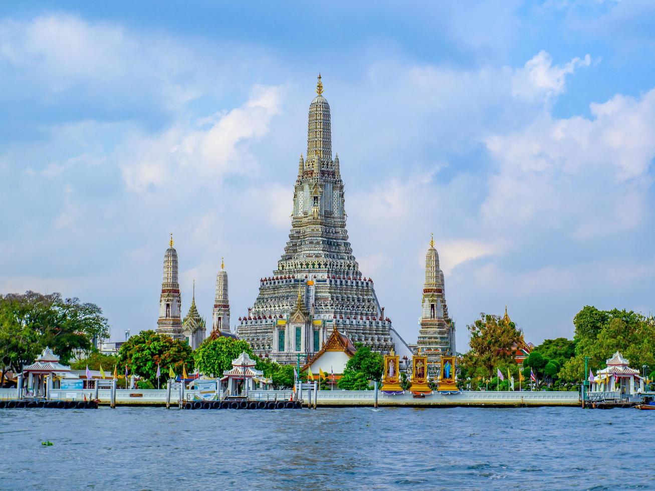 Wat Arun is a famous tourist attraction. It is a place by the river. photo