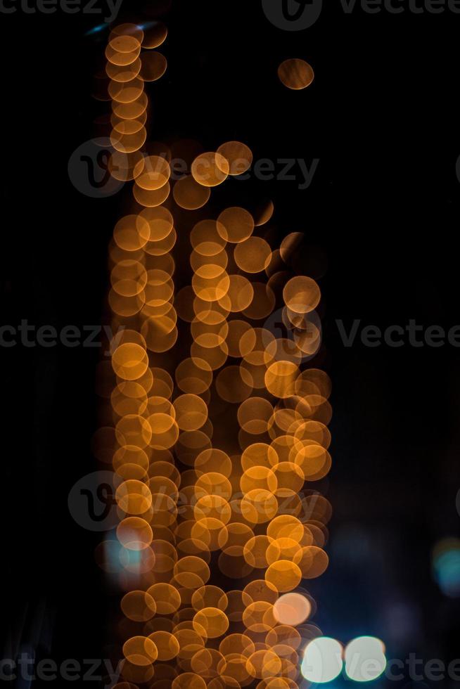 The bokeh lights in dark background. photo