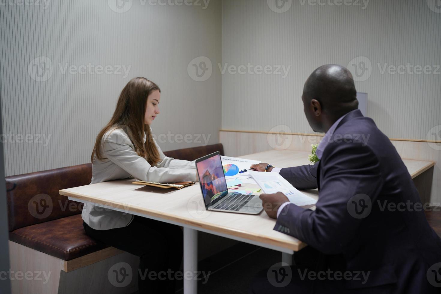 Business people in the workplace are discussing a working strategy for doing business photo