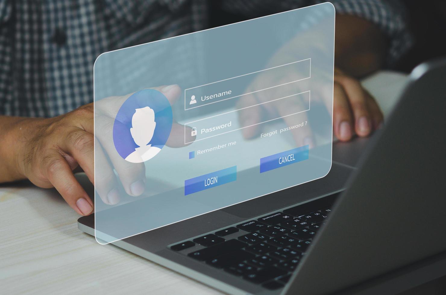 hombre que usa una computadora portátil y se registra o inicia sesión en la pantalla táctil virtual de contraseña de nombre de usuario. foto