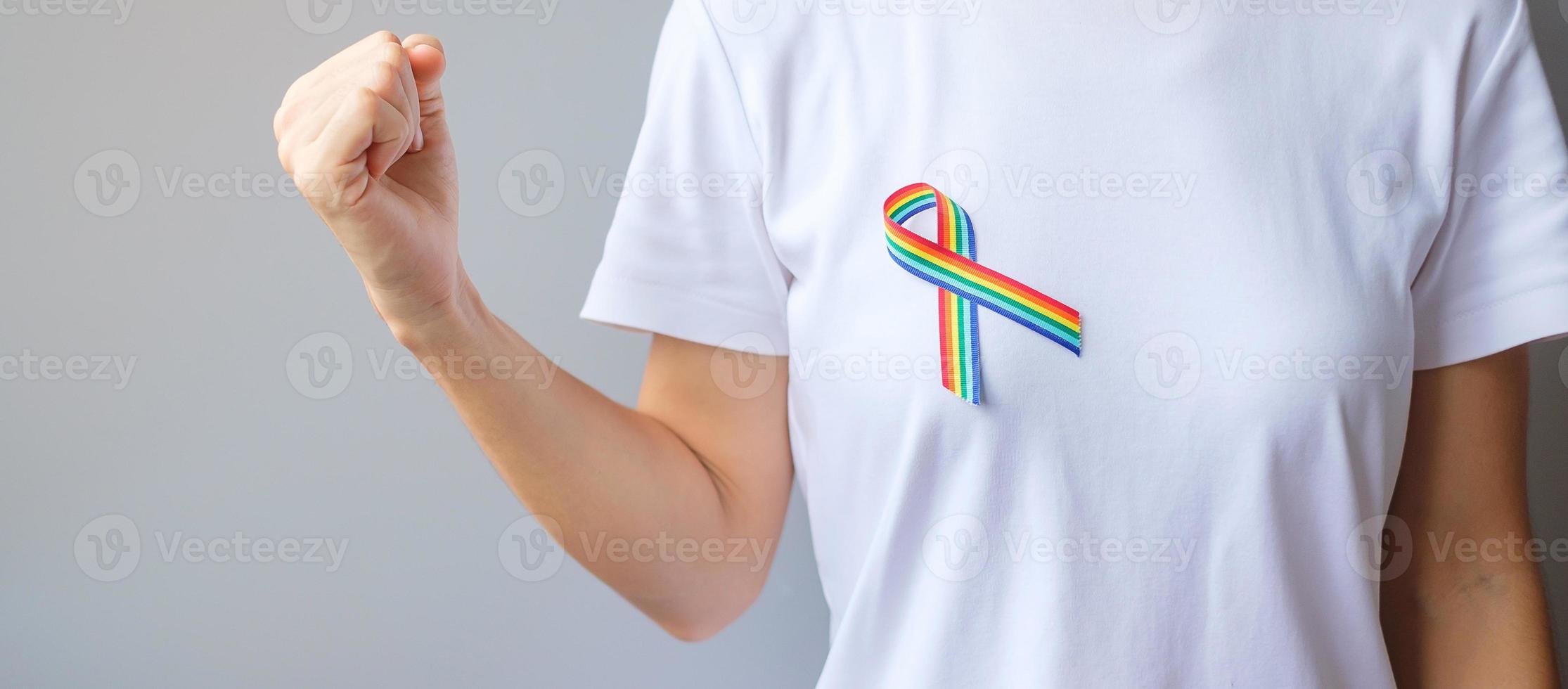 LGBTQ Rainbow ribbon for Support Lesbian, Gay, Bisexual, Transgender and Queer community and Pride month concept photo