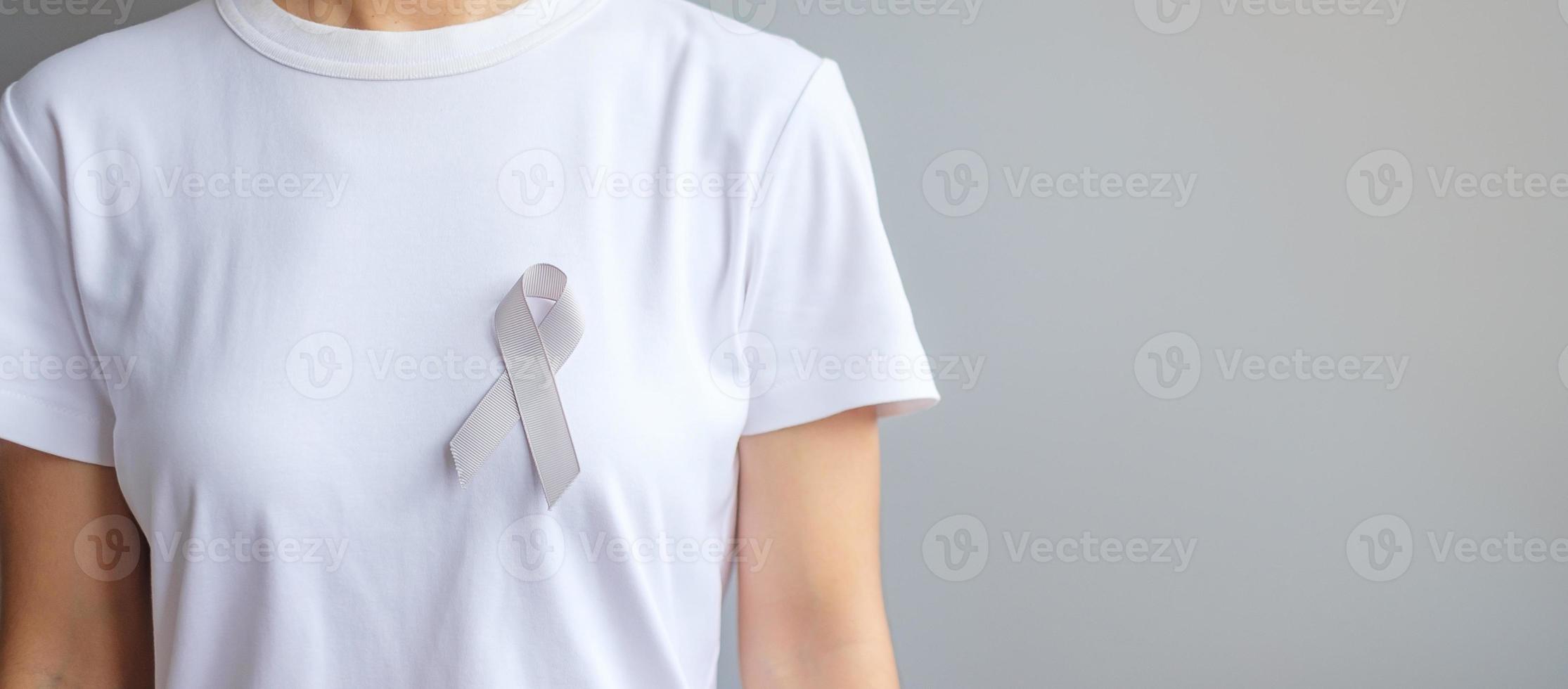 Brain Cancer Awareness month, grey color Ribbon for supporting people living. Healthcare and World cancer day concept photo