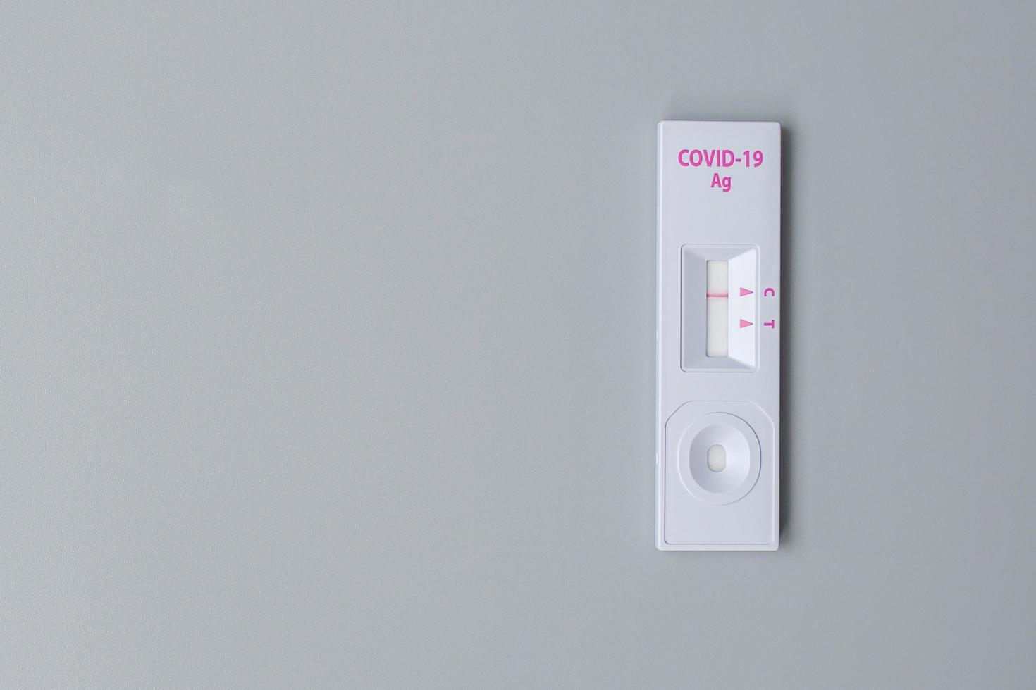 Rapid Antigen Test kit with Negative result during swab COVID-19 testing. Coronavirus Self nasal or Home test, Lockdown and Home Isolation concept photo