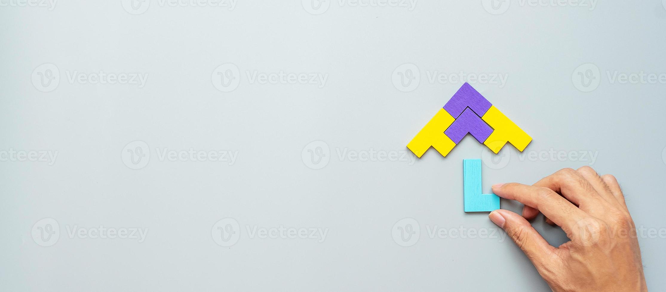 Umbrella shape block of colorful wood puzzle piece on gray background. logical thinking, business logic, Conundrum, decision, solutions, rational, mission, success, goals and strategy concepts photo