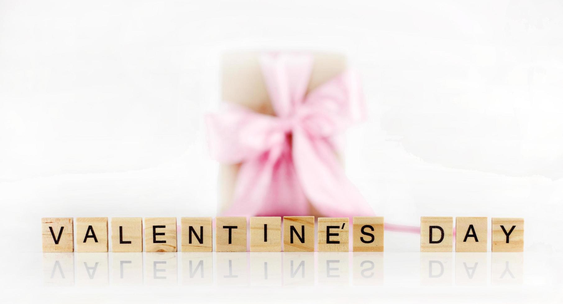 Wooden block show word valentines day photo