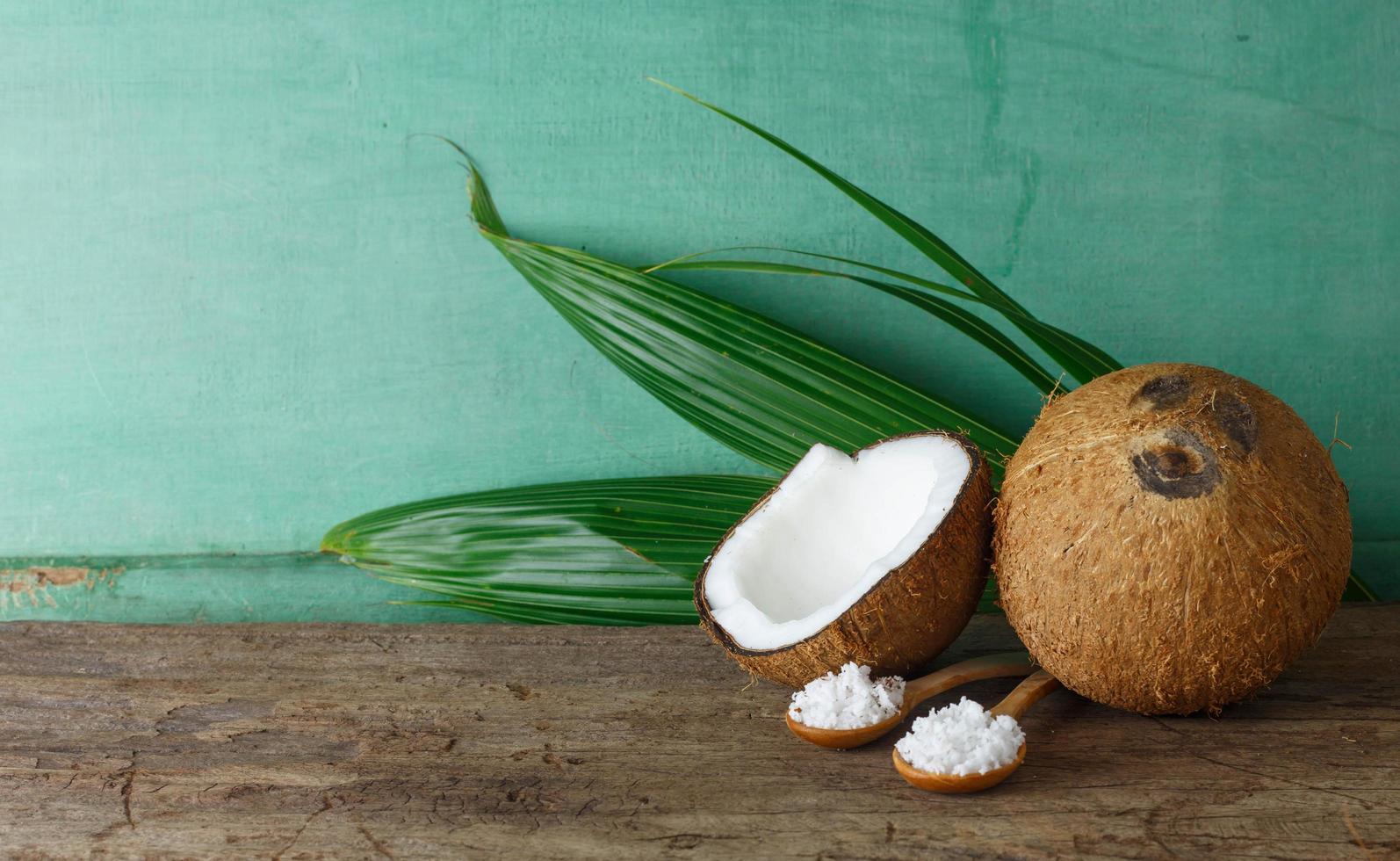 Fresh coconut on wood photo