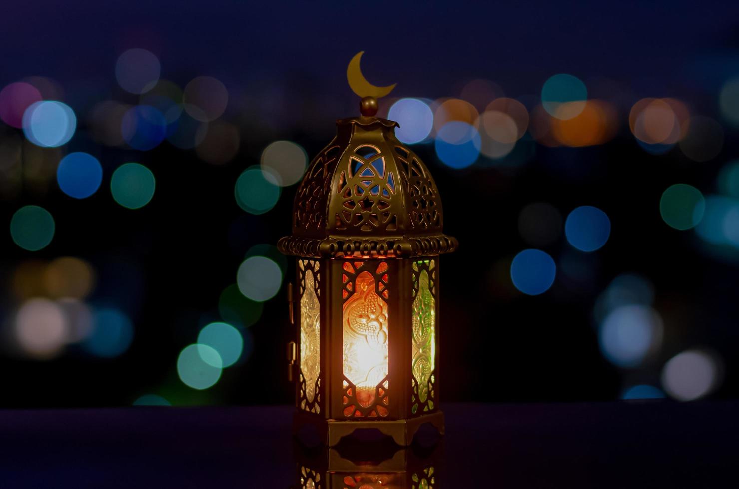 Lantern that have moon symbol on top with night sky photo