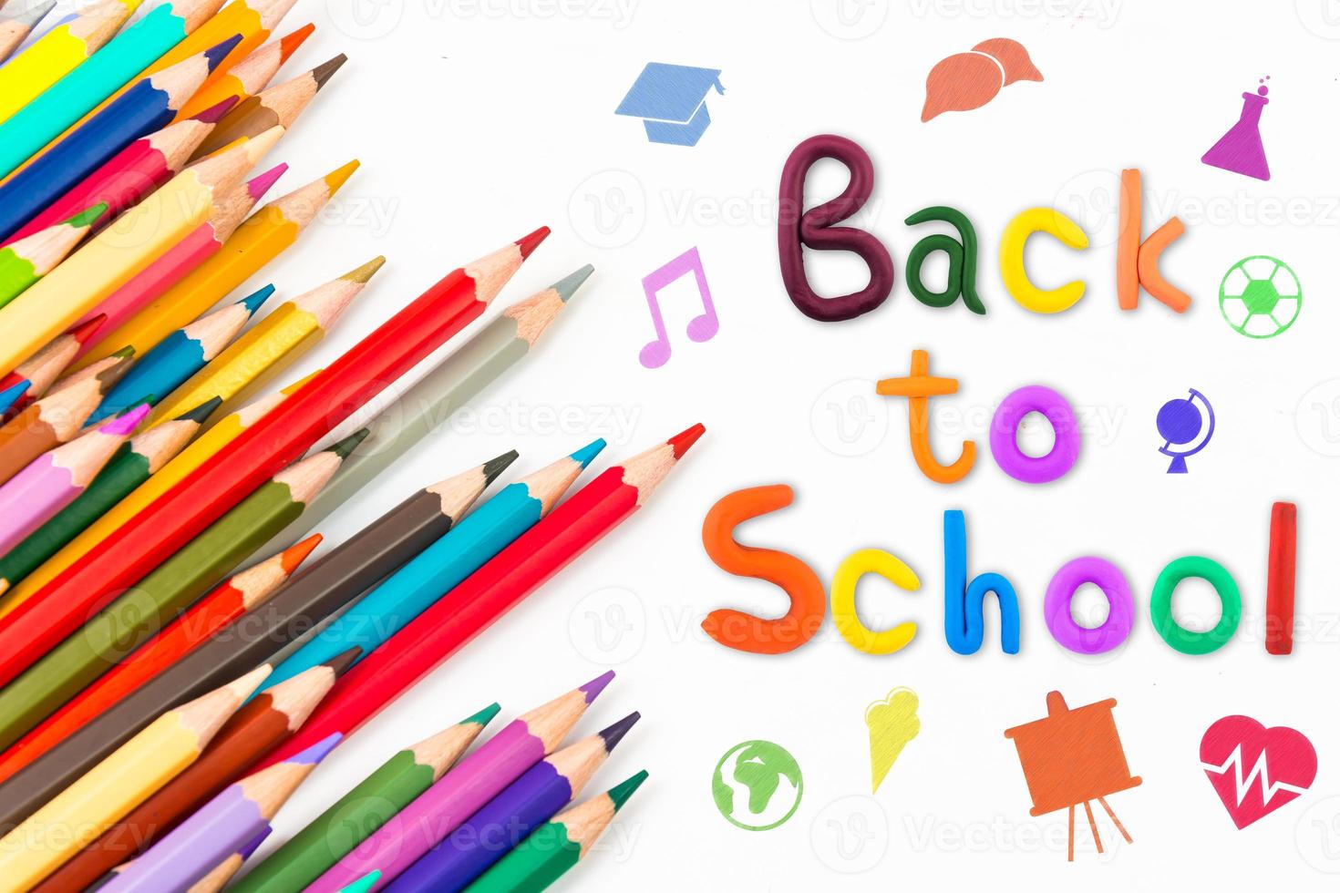 Top view banner message  Back to School  with color pencil Items for the school on white background photo