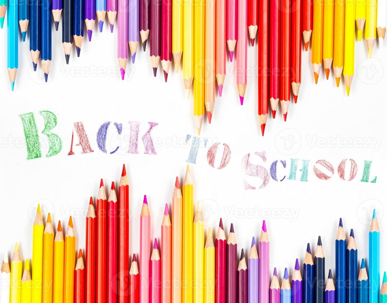 Top view banner message  Back to School  with color pencil Items for the school on white background photo