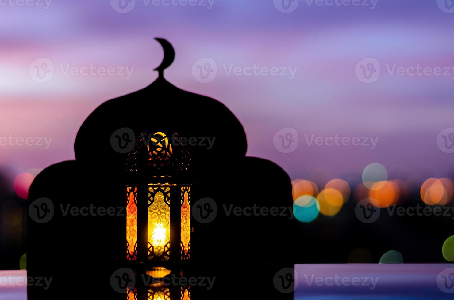 Lantern with blurred focus of mosque background photo