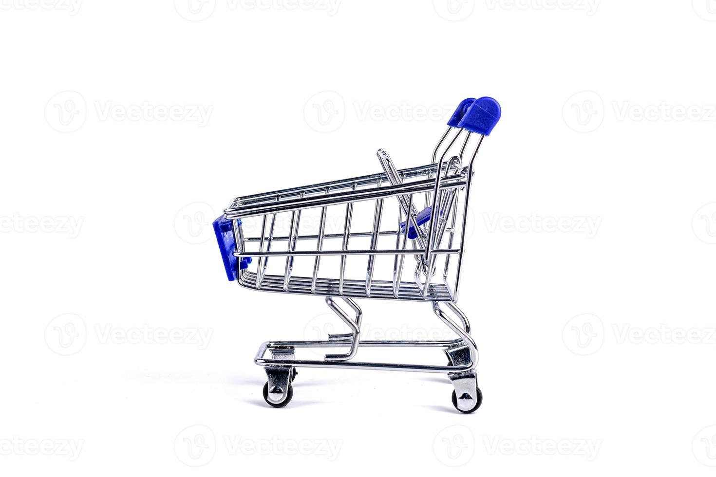 Classic Shopping cart trolley on white background photo