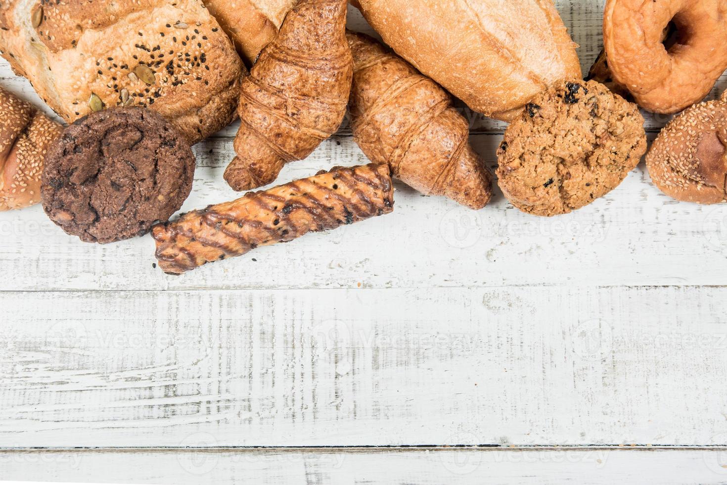 bakery on wood white background different types of bread photo