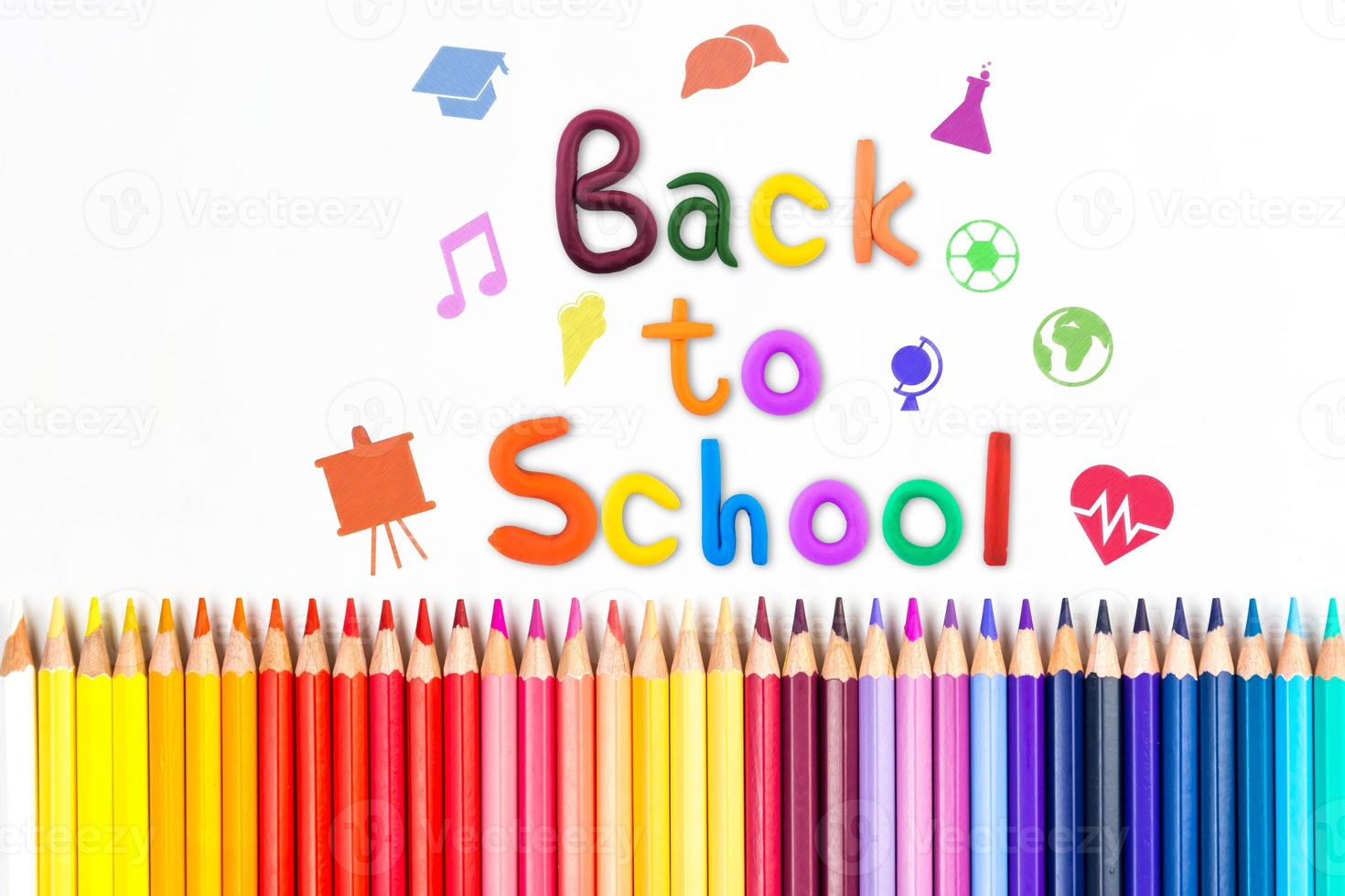 Top view banner message  Back to School  with color pencil Items for the school on white background photo