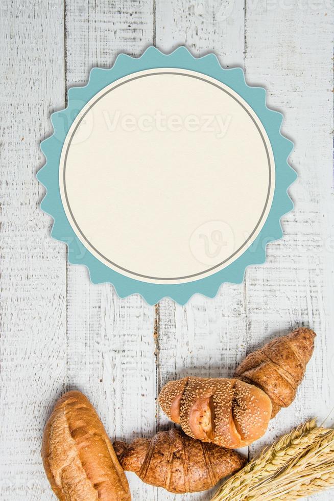 bakery on wood white background different types of bread photo